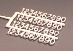 Numbers white , 7-8 mm high , 4 x 0 to 9